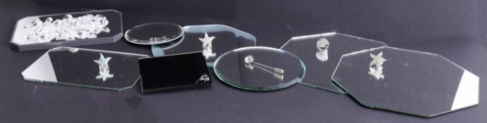 Swarovski Crystal Glass, mixed collection including glass stands, cleaning cloths, crystal tattoo,