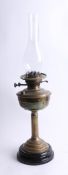 A twin wick oil lamp, by Wright & Butler, Birmingham, with glass flue.