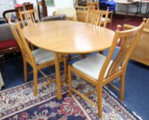 Ercol, a well kept modern dining room suite, comprising six chairs, including two carvers with