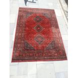 A patterned floor rug label marked 'Afghan', 2.01m x 2.90m.