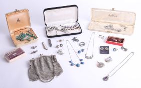 A collection of various costume jewellery, including pendants, Ciro necklaces, brooches, chainmail