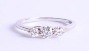 An 18ct yellow gold diamond three stone ring, approx. 0.50ct, estimated colour and clarity D/SI1,