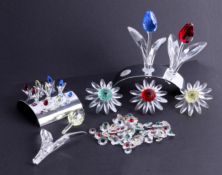 Swarovski Crystal Glass, collection of Tulips with stand, other flowers and small crystal stones (