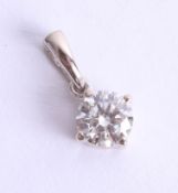 An 18ct white gold and diamond pendant, approx. 0.60ct, estimated colour and clarity D/SI1.