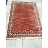 A patterned floor rug possibly Persian?, 2.00m x 2.95m.