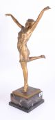 A bronze figure of a dancing lady of Art Deco style (damaged) on a marble base, signed Otto