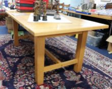 A good quality light oak refectory dining table, purchased from Codrington Furniture, London SW8,