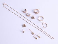 A collection of 9ct gold and middle eastern jewellery, approx 10g.