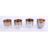 Asahi Shoten, foursterling silver beakers, marked 950, gilt lined, with inscriptions, 8.05 oz.