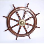 An early 20th century ship wheels. This wheel began on the Raymond J. Anderton, a ‘Menhaden