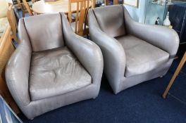 A pair of Matthew Pilton Balzac armchairs, upholstered in leather with SCP label.