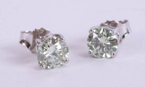 A pair of blue diamond ear studs, approximately 1.6ct.