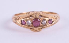 An 18ct antique ruby and diamond five stone ring, 3.7g, size N/O.