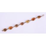 A 9ct citrine bracelet, set with 7 stones, length 19cm.