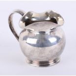 A silver Victorian cream jug, London, Maker J.A./I.S., total weight 3oz.