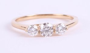 An 18ct yellow gold and diamond trilogy ring, approx. 0.50ct, estimated colour and clarity D/SI1,