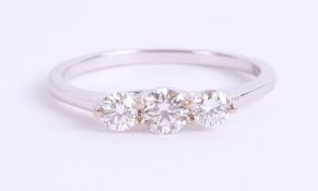 An 18ct white gold and diamond trilogy ring, approx. 0.50ct, estimated colour and clarity D/SI1,