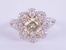 18ct white gold daisy-style, ornate dress ring set with a central fancy RBC diamond (1.36ct)