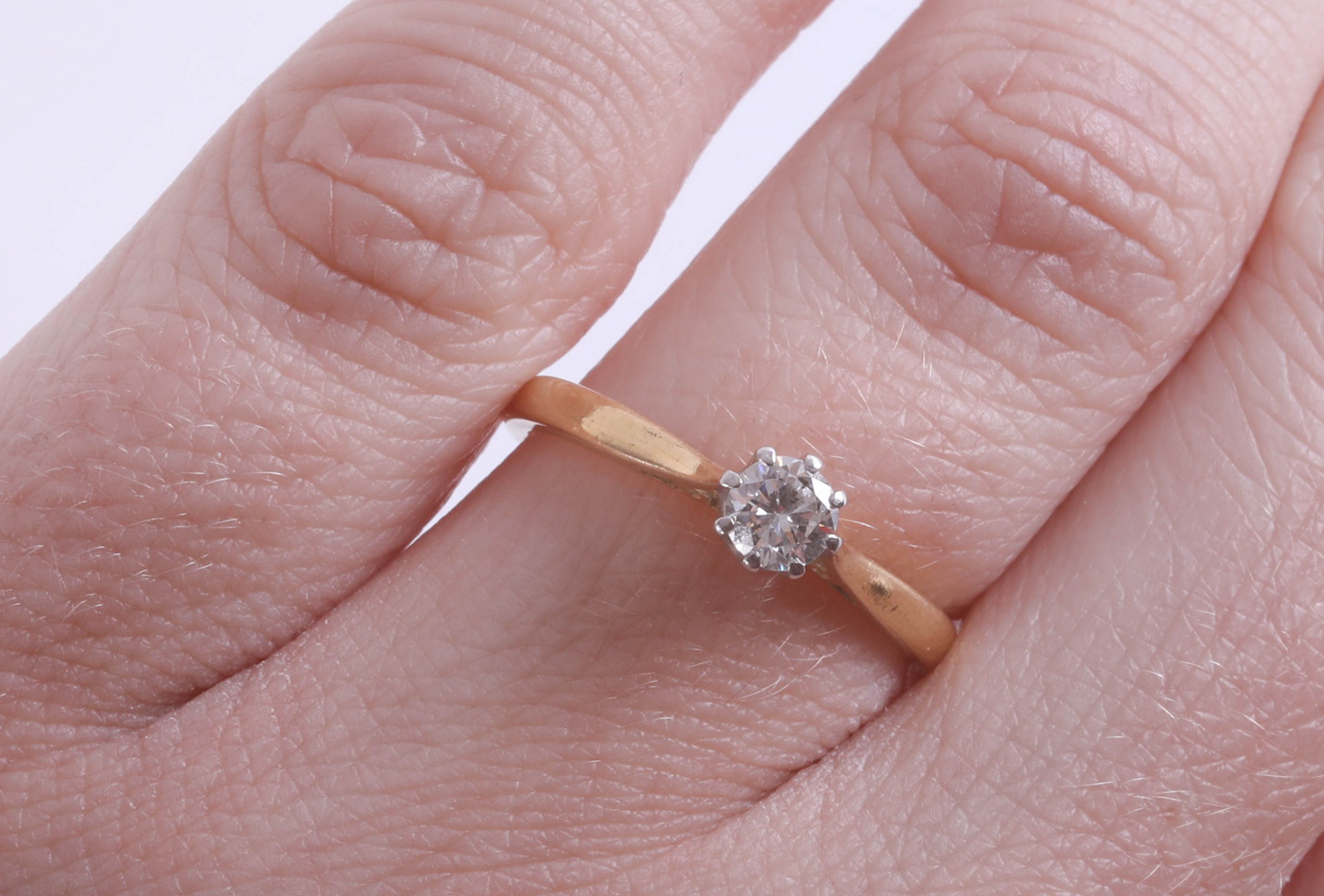 An 18ct diamond solitaire ring, approximately .25ct. - Image 2 of 2