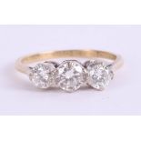 An 18ct diamond three stone ring, approx. 1ct, size T.