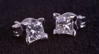 Pair of 18ct white gold 4 claw-set princess cut diamond studs, boxed. Diamonds 0.74ct