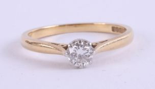 An 18ct diamond solitaire ring, approximately .25ct.