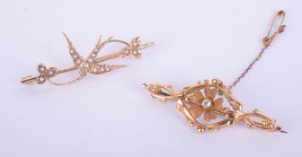 Two gold and diamond set brooches, including flowered design and swift bird design set with seed