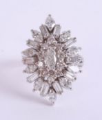 An impressive diamond marquise ring, set with various cut diamonds in white gold/platinum?, head