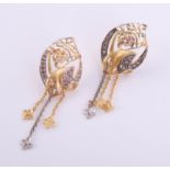 A pair of Mansura Arabic high carat gold earrings, Arabic markings with purchase box marked Damas,