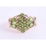 A 9ct diopside dress ring, size R.