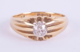 An 18ct diamond solitaire ring, possibly gents, set in yellow gold, 8g, size X.