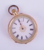 A Victorian 18ct fob watch, the enamel dial with gilt decoration, black Roman numerals and gold