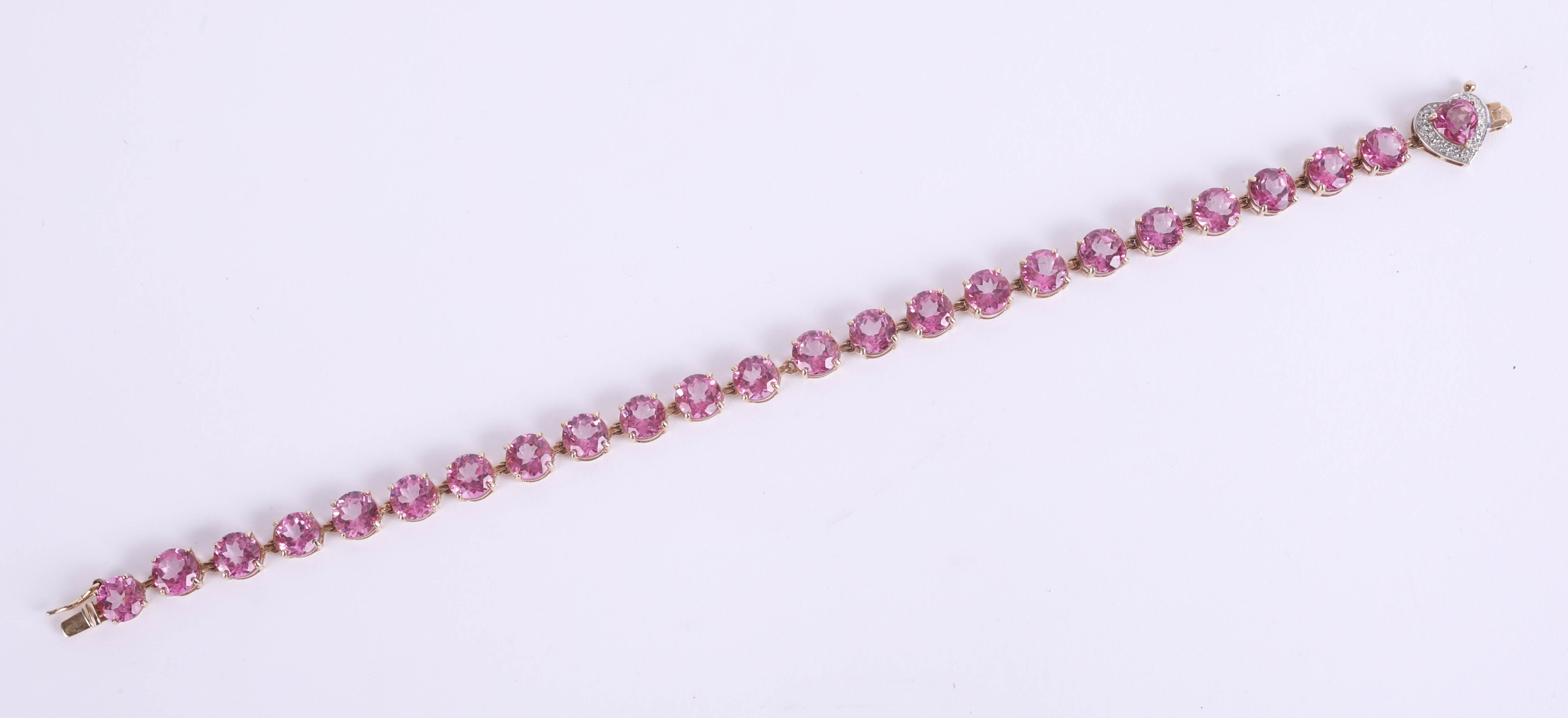 A 9ct pink topaz and diamond set bracelet, length 20cm.