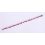 A 9ct pink topaz and diamond set bracelet, length 20cm.