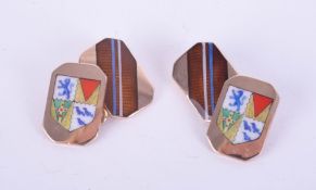 A pair of 9ct gold and enamelled cufflinks.