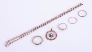 An antique 9ct pearl set pendant, two 9ct gold rings, two other rings and a yellow metal chain