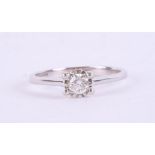 A 9ct white gold and diamond solitaire ring, size J.