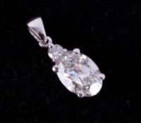 An 18ct diamond pendant, oval cut, approximately 1.10ct, colour I, clarity VS 2 set in white gold.