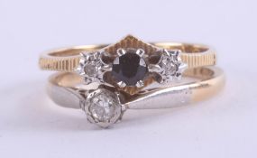 Two 18ct rings set with small sapphires and diamonds, total weight approximately 4.9g.