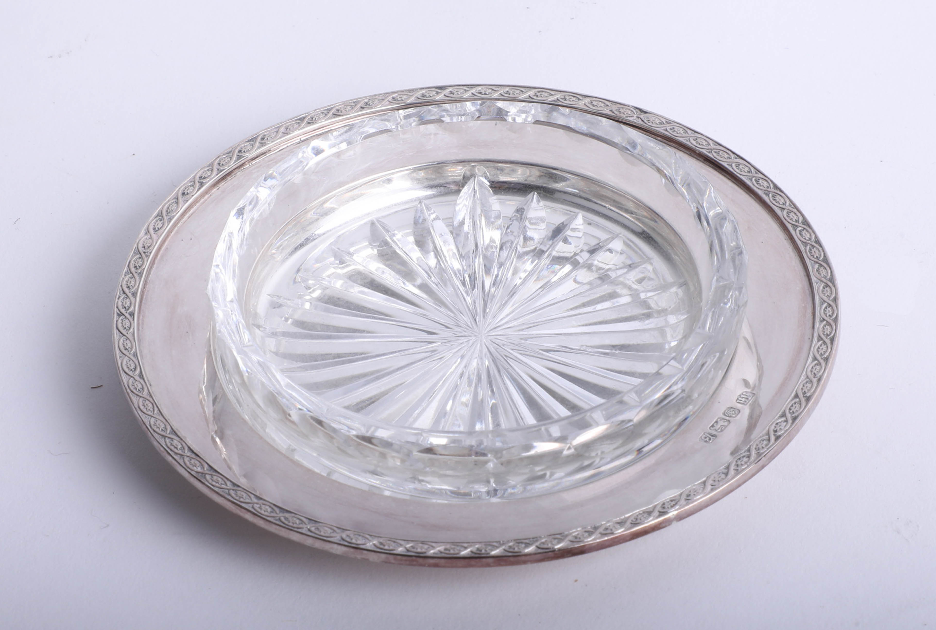 A silver butter dish with original crystal liner, by Mappin & Webb Ltd London, Sheffield, Maker H.