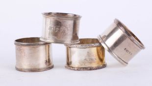 A Harlequin set of silver hallmarked napkin rings, approximate total weight 4oz.