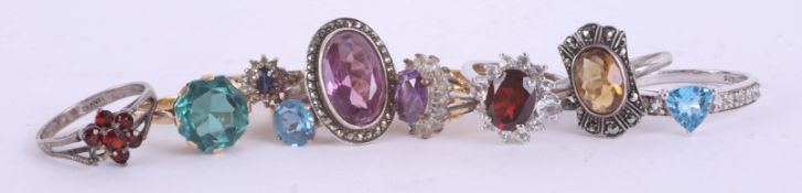 A collection of dress rings including a 9ct gold ring, 18ct gold ring etc.