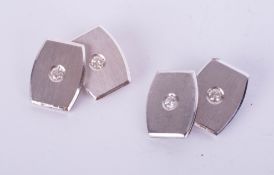 A pair of 18ct white gold and diamond set cufflinks, boxed, box marked Mappin and Webb, London.