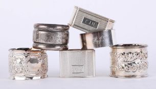 Harlequin set 6 silver hallmarked fancy napkin rings with embossed and engine turned decoration,