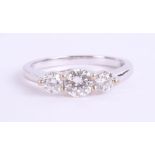 An 18ct white gold and diamond trilogy ring, approx. 1.00ct, estimated colour and clarity D/SI1,