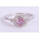 A 9ct pink sapphire and diamond dress ring, size K.