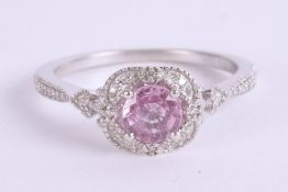 A 9ct pink sapphire and diamond dress ring, size K.