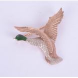 A three colour gold and enamel bird brooch, marked 375, 9, J.G & S, height 30mm.