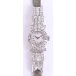 An Art Deco diamond cocktail watch, the circular dial with Arabic numeral, in possibly its