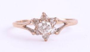 A 9ct gold and diamond ring, size M.